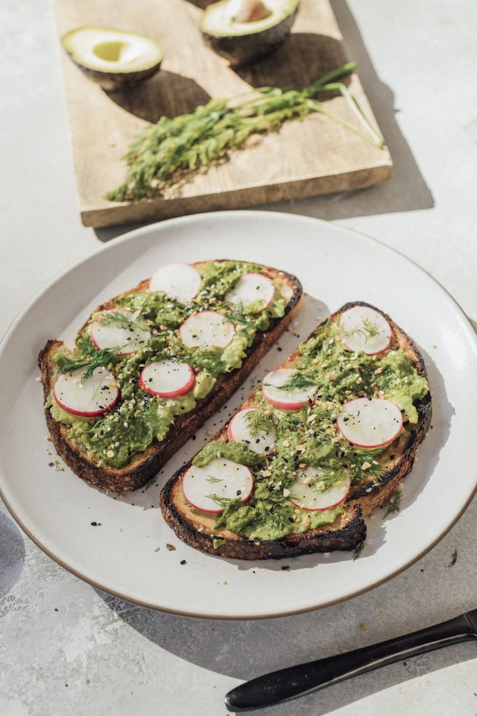 avocado toast with kale pesto and crunchy veggies