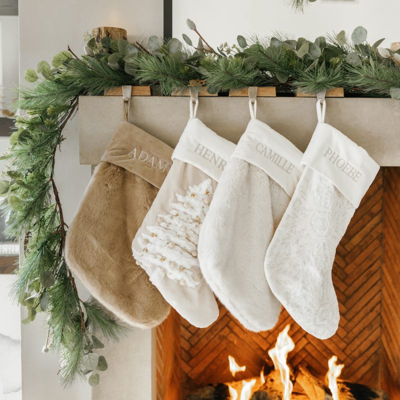 Camille Styles holiday decor greenery gamantel, hanging stockings