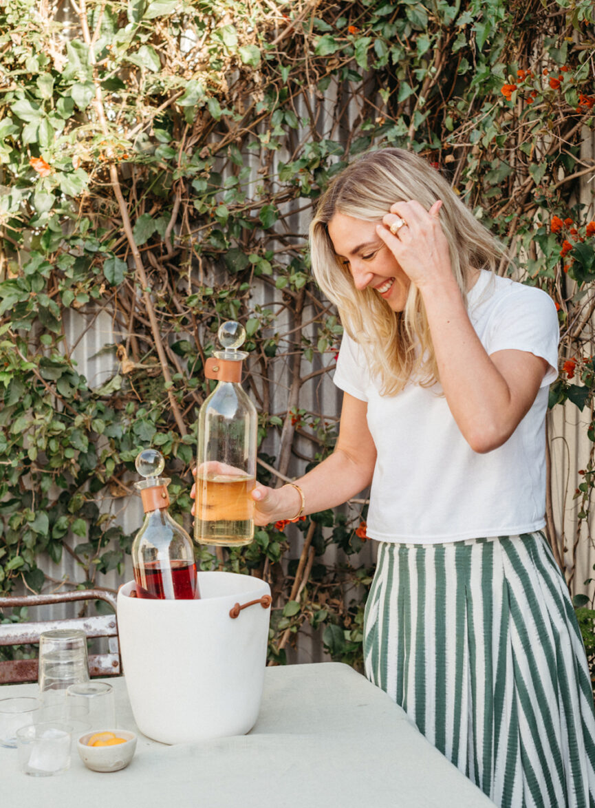 Woman mixing drinks.