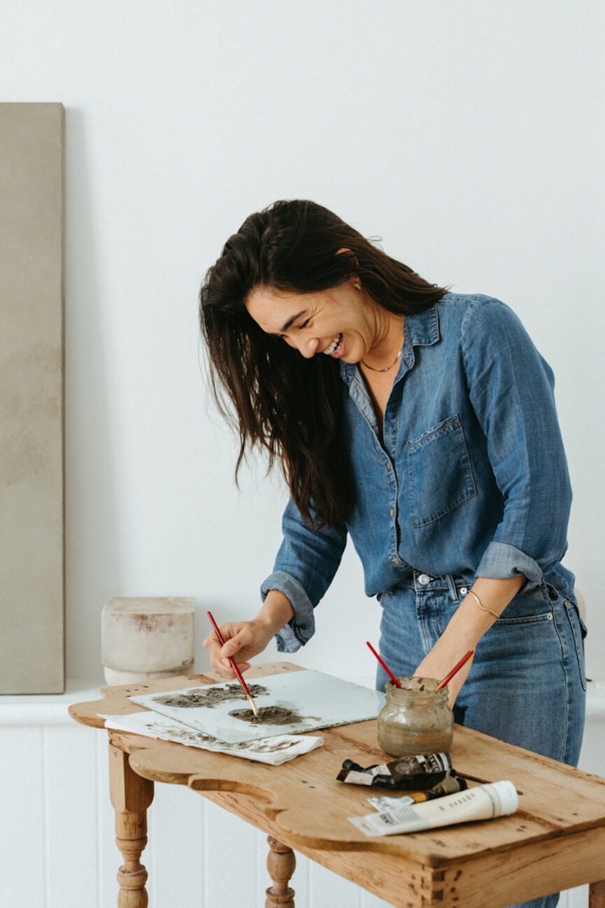 Woman painting.