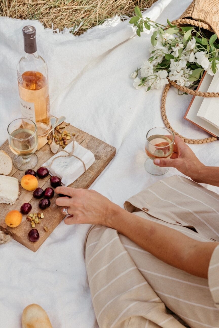 Drinking rosé at picnic.