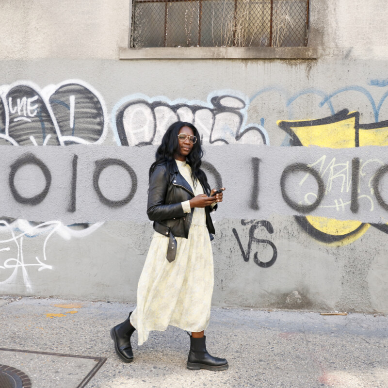 woman in dress and leather jacket school drop off outfits